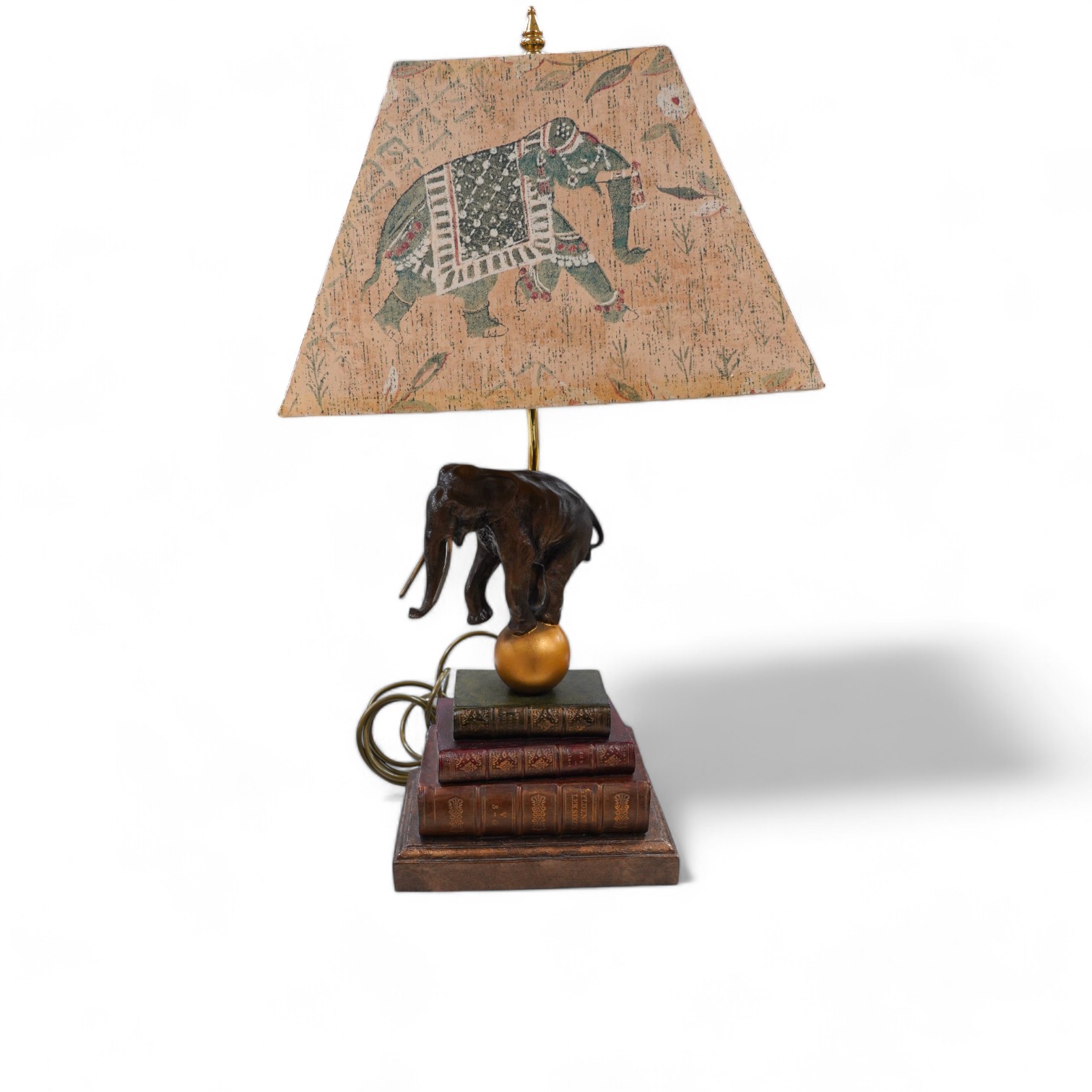 A Thomas Blakemore style ‘elephant’ and faux book table lamp with shade, 64cm. Condition - good, not tested as working